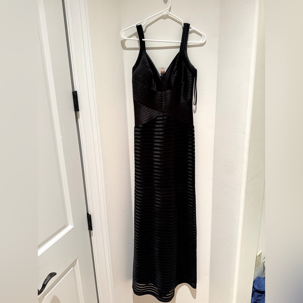 BCBG MAXAZRIA size 2 black gown. Only worn once in smoke and pet free home.